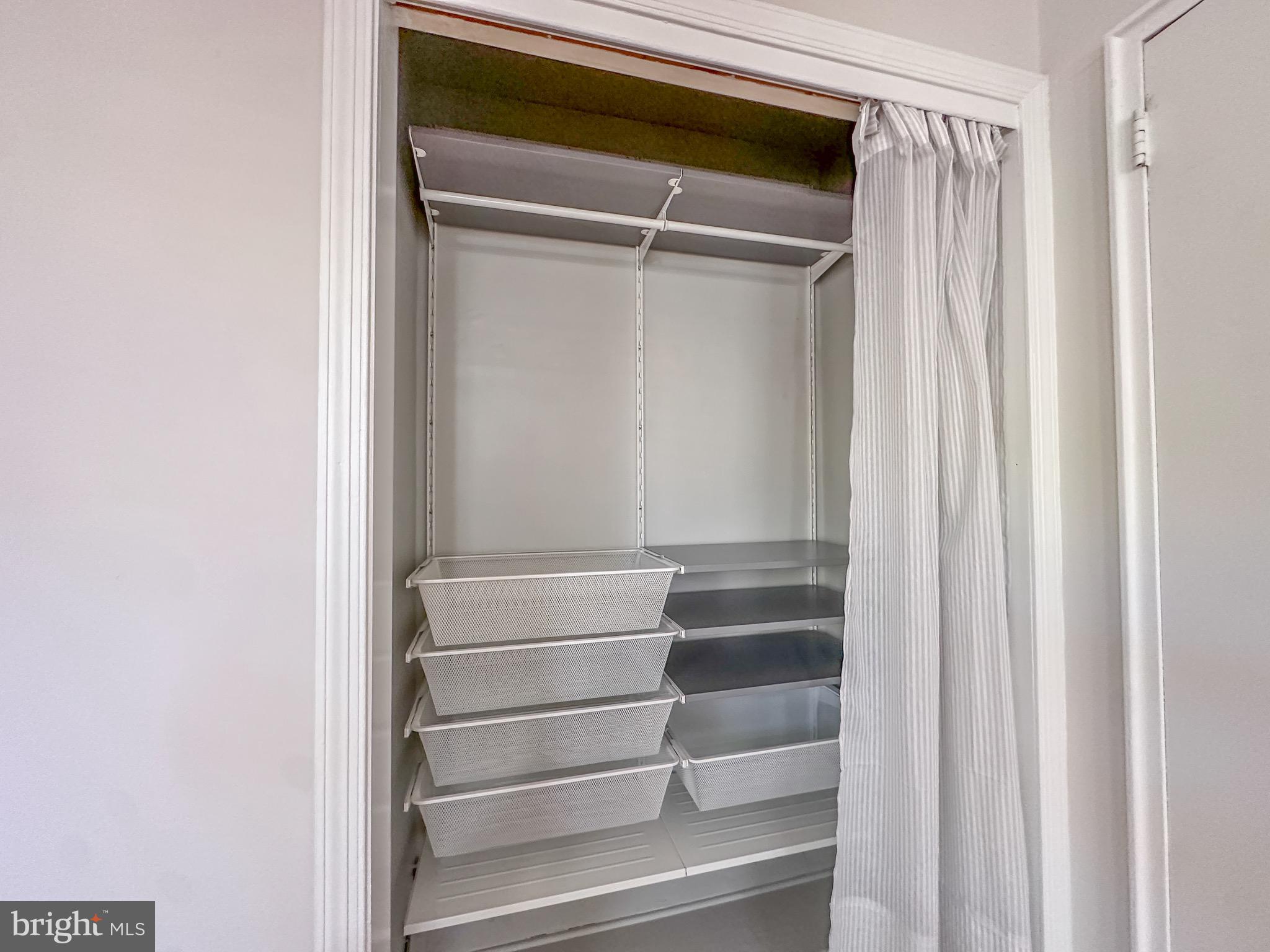 226 Guthrie Avenue Alexandria, VA 22305 - Photo 28 of 54 a view of walk in closet with empty racks