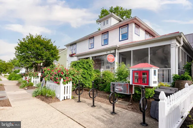 a street sign on a pole on a street