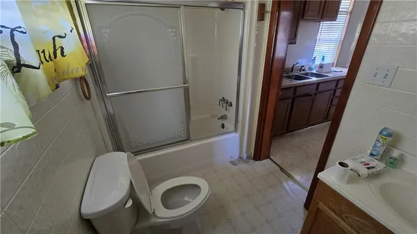 a bathroom with a sink and mirror