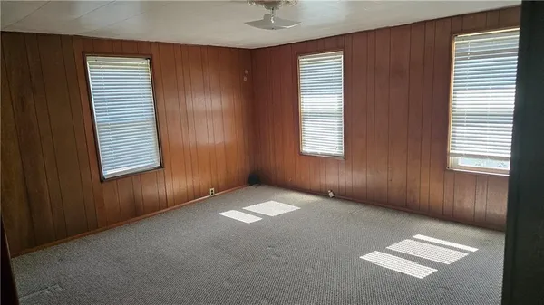 an empty room with windows