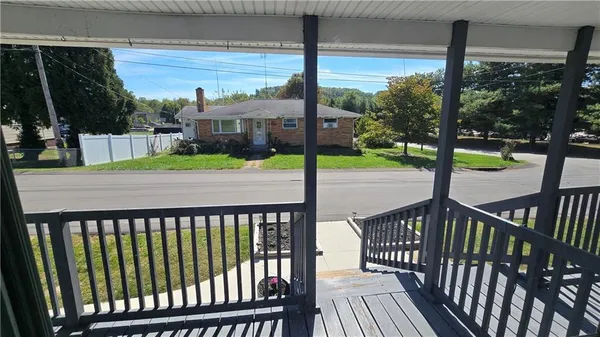a house view with a garden space