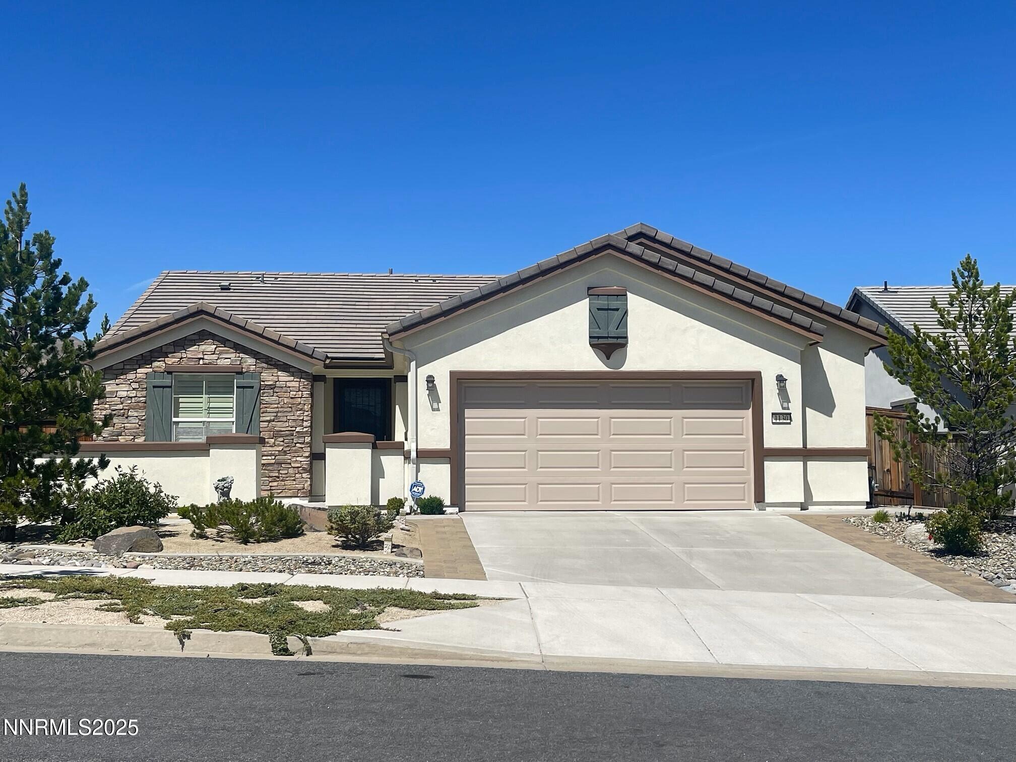 1130 Callaway Trail Reno, NV 89523 - Photo 1 of 1 a front view of a house with a yard