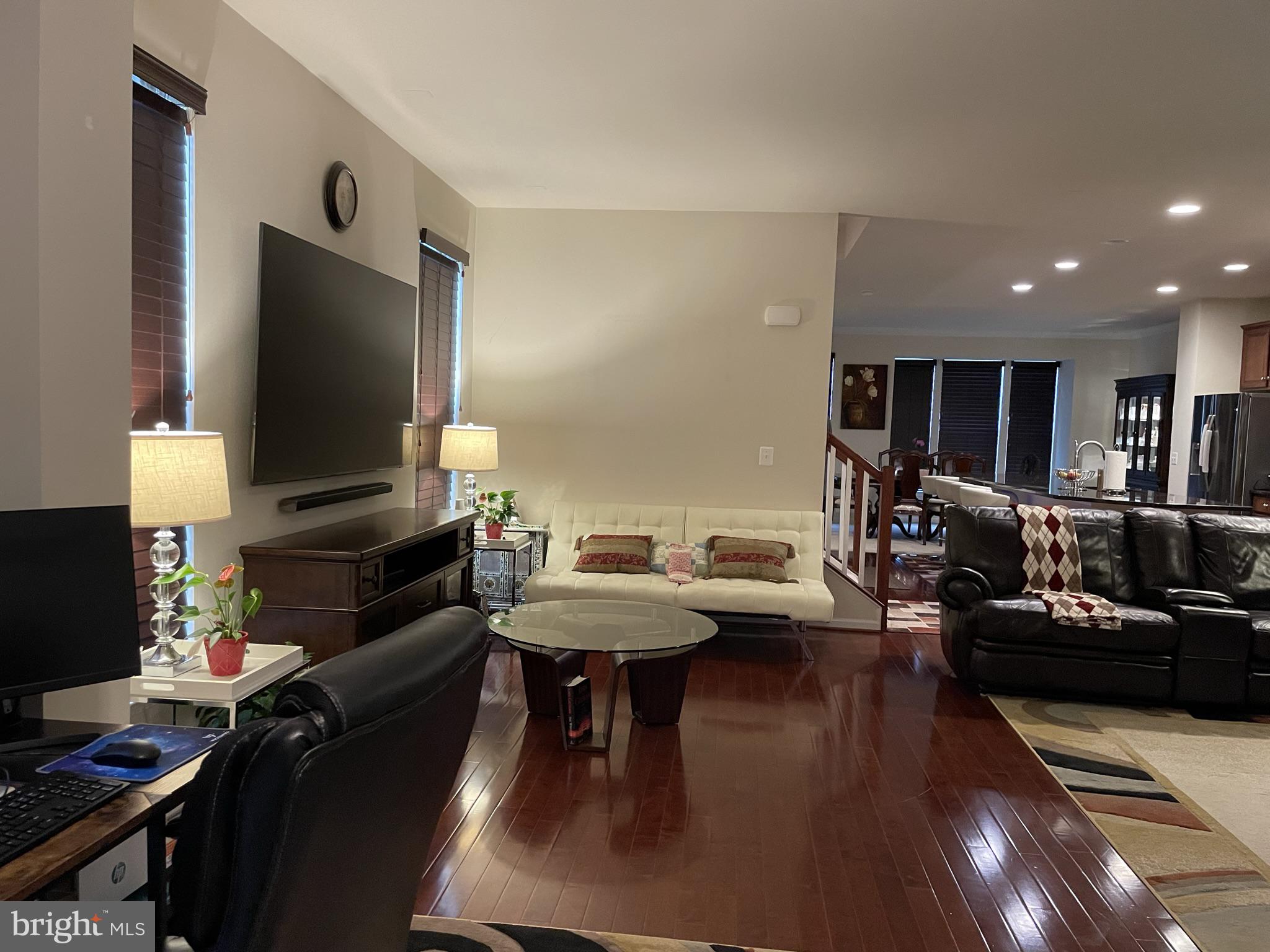 25271 Sackwheat Square Chantilly, VA 20152 - Photo 11 of 24 a living room with furniture and a flat screen tv