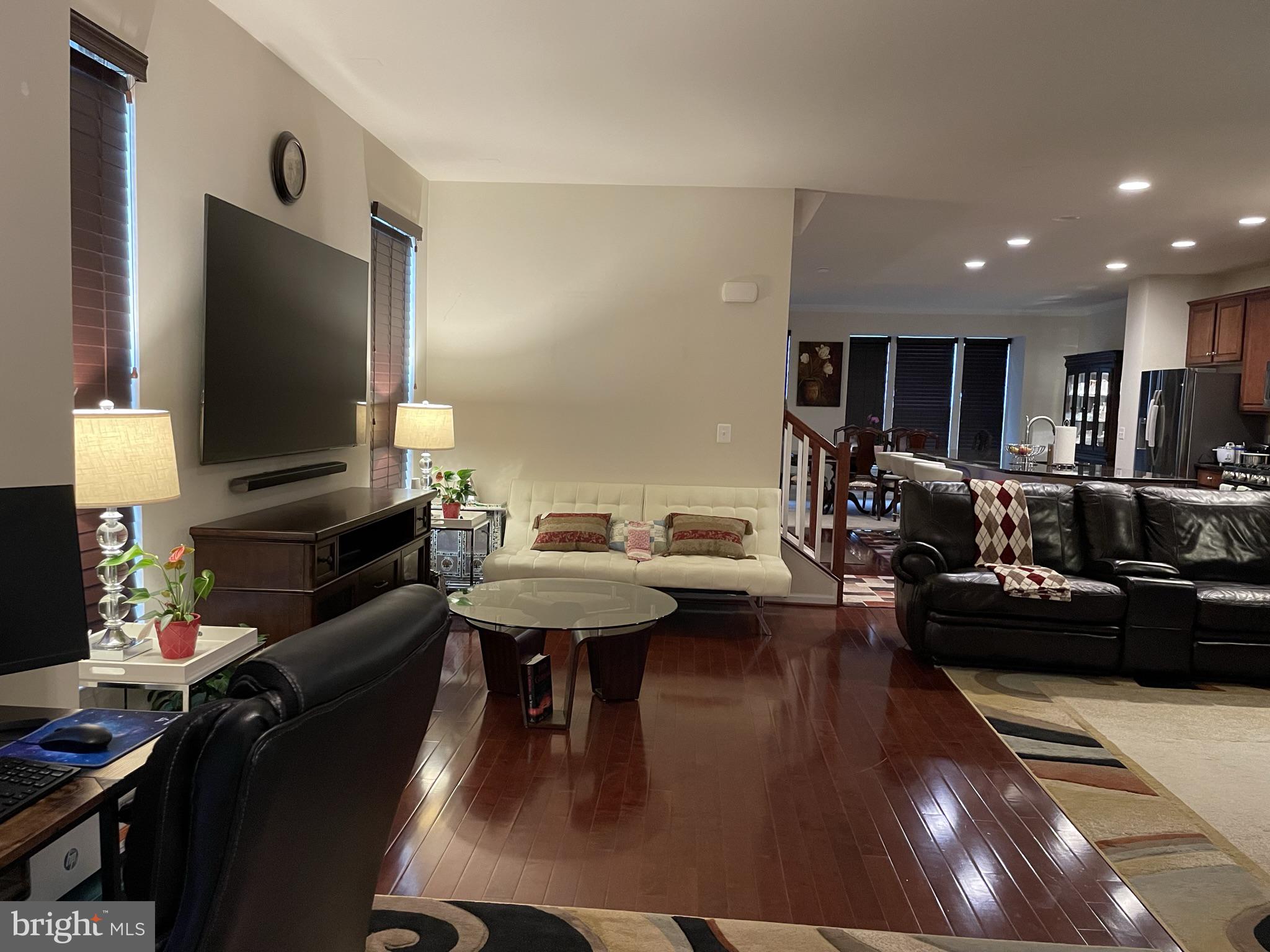 25271 Sackwheat Square Chantilly, VA 20152 - Photo 12 of 24 a living room with furniture and a flat screen tv