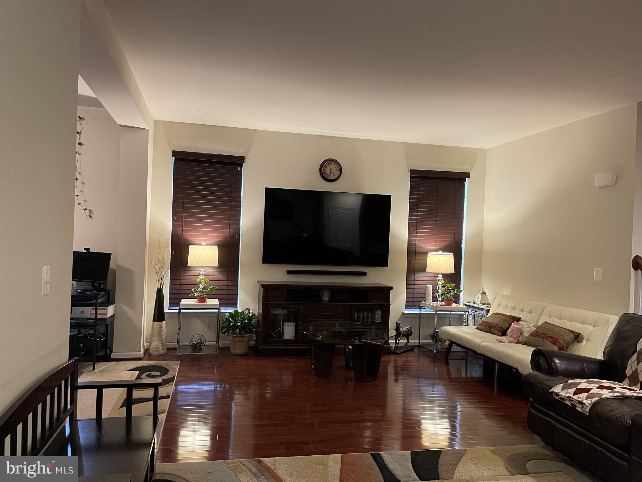 25271 Sackwheat Square Chantilly, VA 20152 - Photo 13 of 24 a living room with furniture and a flat screen tv