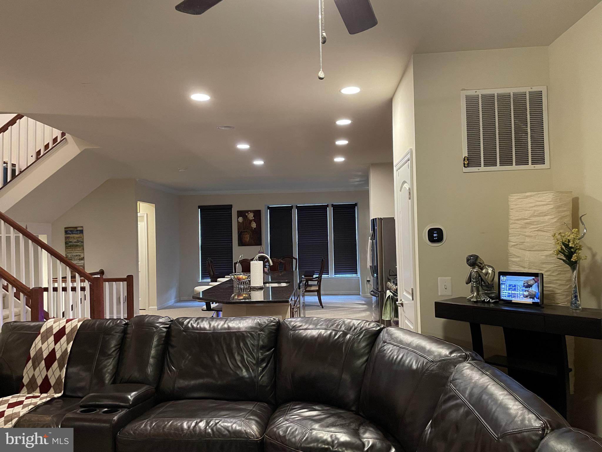 25271 Sackwheat Square Chantilly, VA 20152 - Photo 14 of 24 a living room with furniture and a flat screen tv
