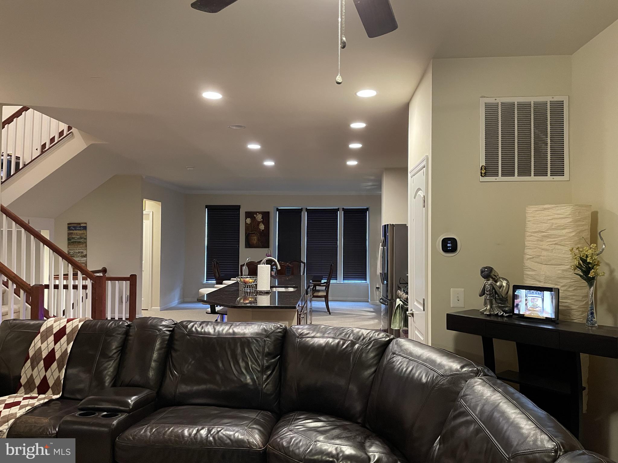 25271 Sackwheat Square Chantilly, VA 20152 - Photo 15 of 24 a living room with furniture and wooden floor