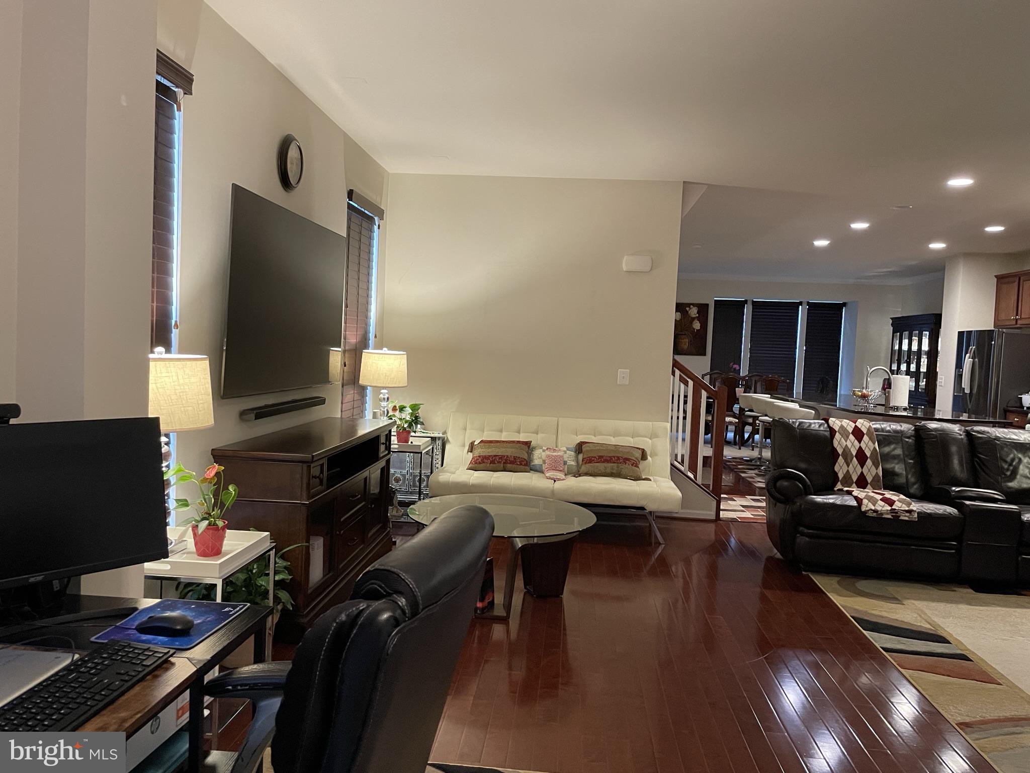 25271 Sackwheat Square Chantilly, VA 20152 - Photo 17 of 24 a living room with furniture and a flat screen tv