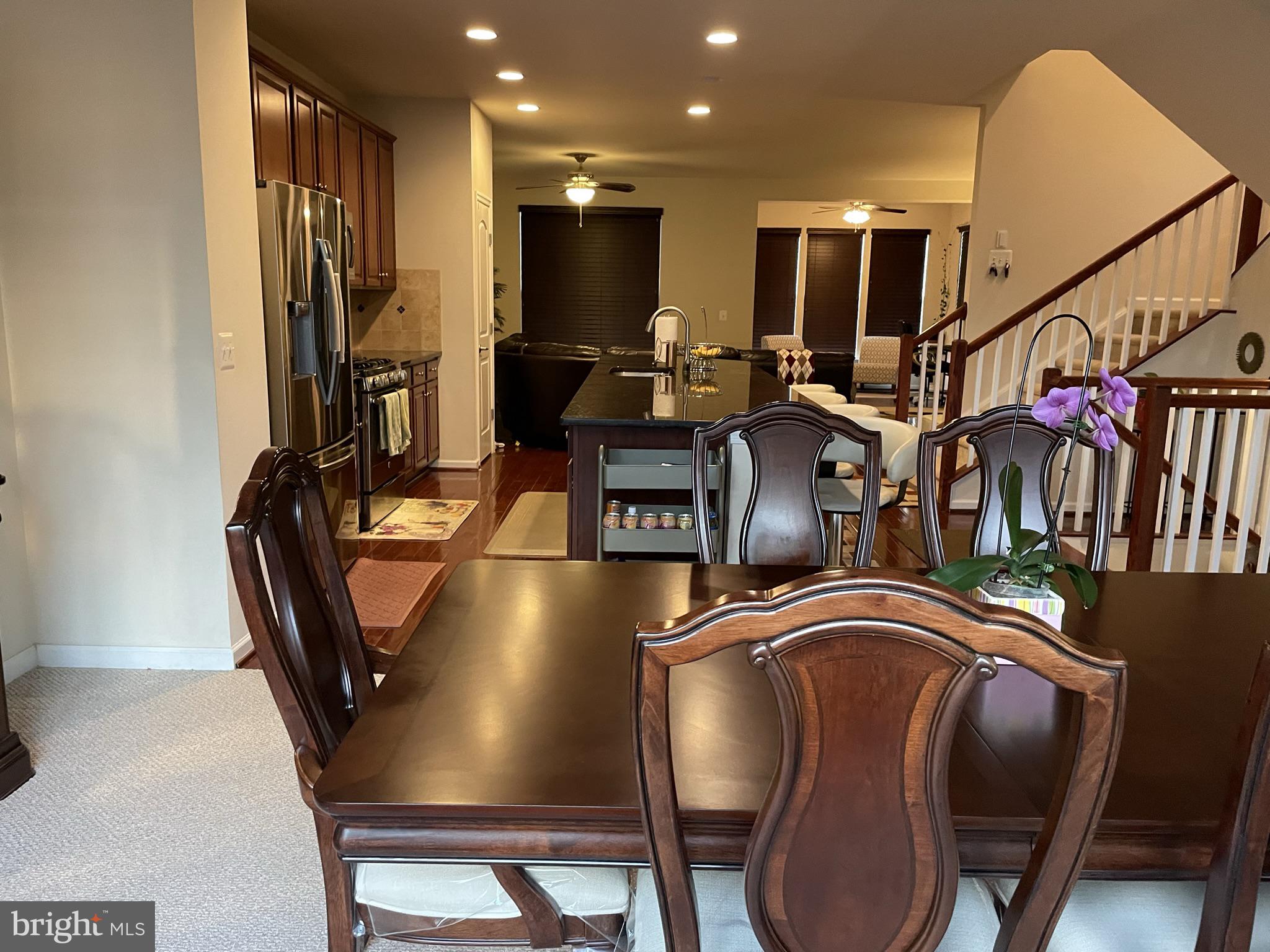 25271 Sackwheat Square Chantilly, VA 20152 - Photo 19 of 24 a view of a dining room with furniture