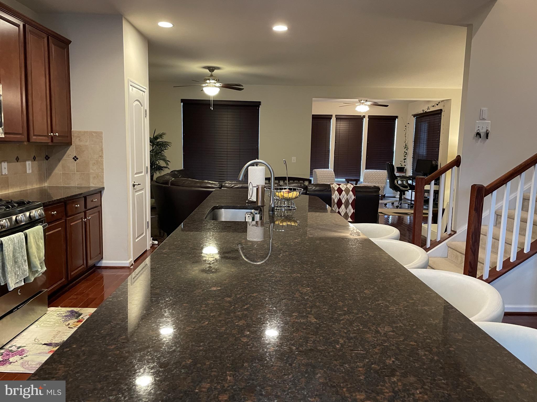 25271 Sackwheat Square Chantilly, VA 20152 - Photo 21 of 24 a large kitchen with stainless steel appliances a large counter top