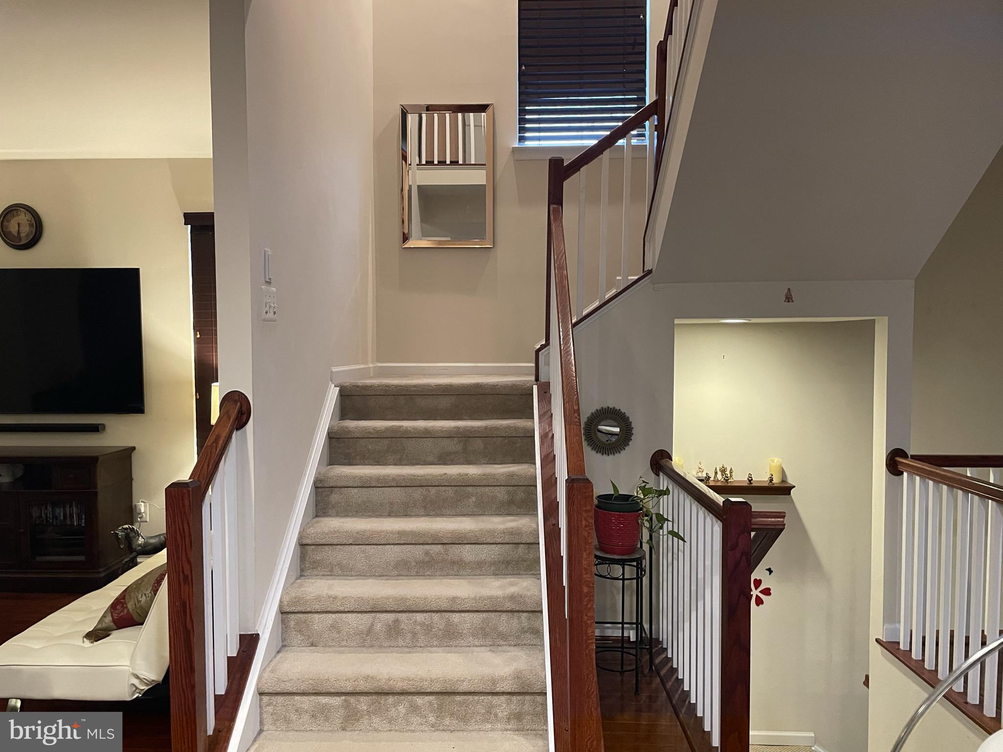 25271 Sackwheat Square Chantilly, VA 20152 - Photo 23 of 24 a view of entryway and hall with wooden floor