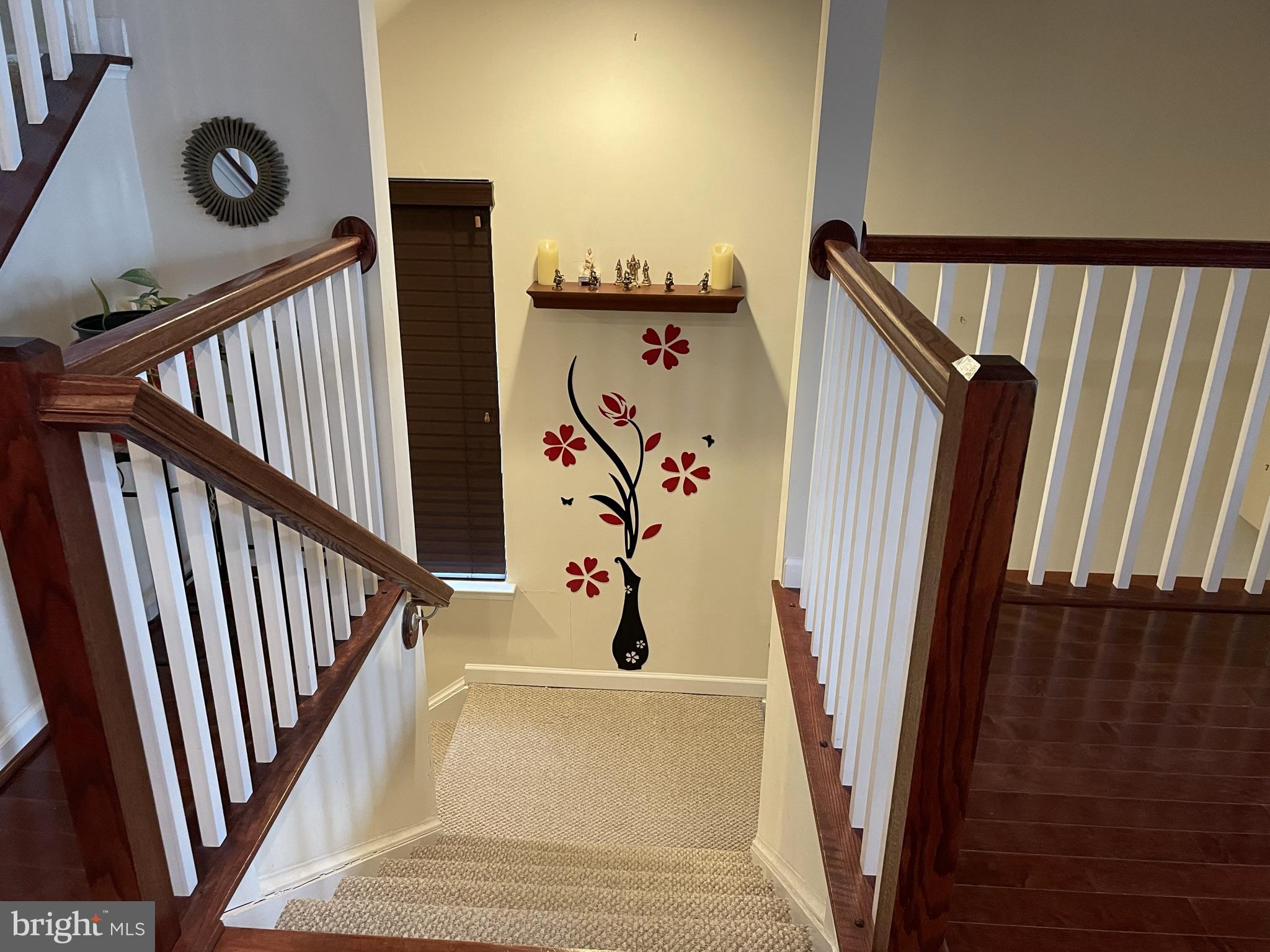 25271 Sackwheat Square Chantilly, VA 20152 - Photo 5 of 24 a view of staircase with white walls and a window