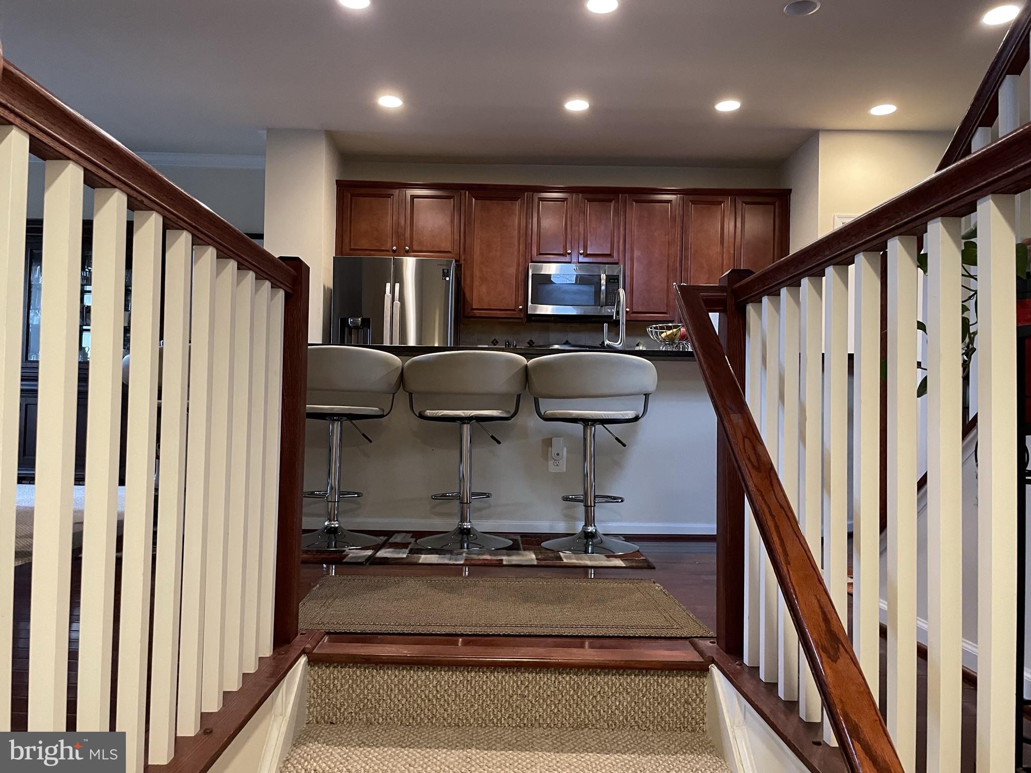 25271 Sackwheat Square Chantilly, VA 20152 - Photo 6 of 24 a view of kitchen with stainless steel appliances granite countertop refrigerator and stove top oven