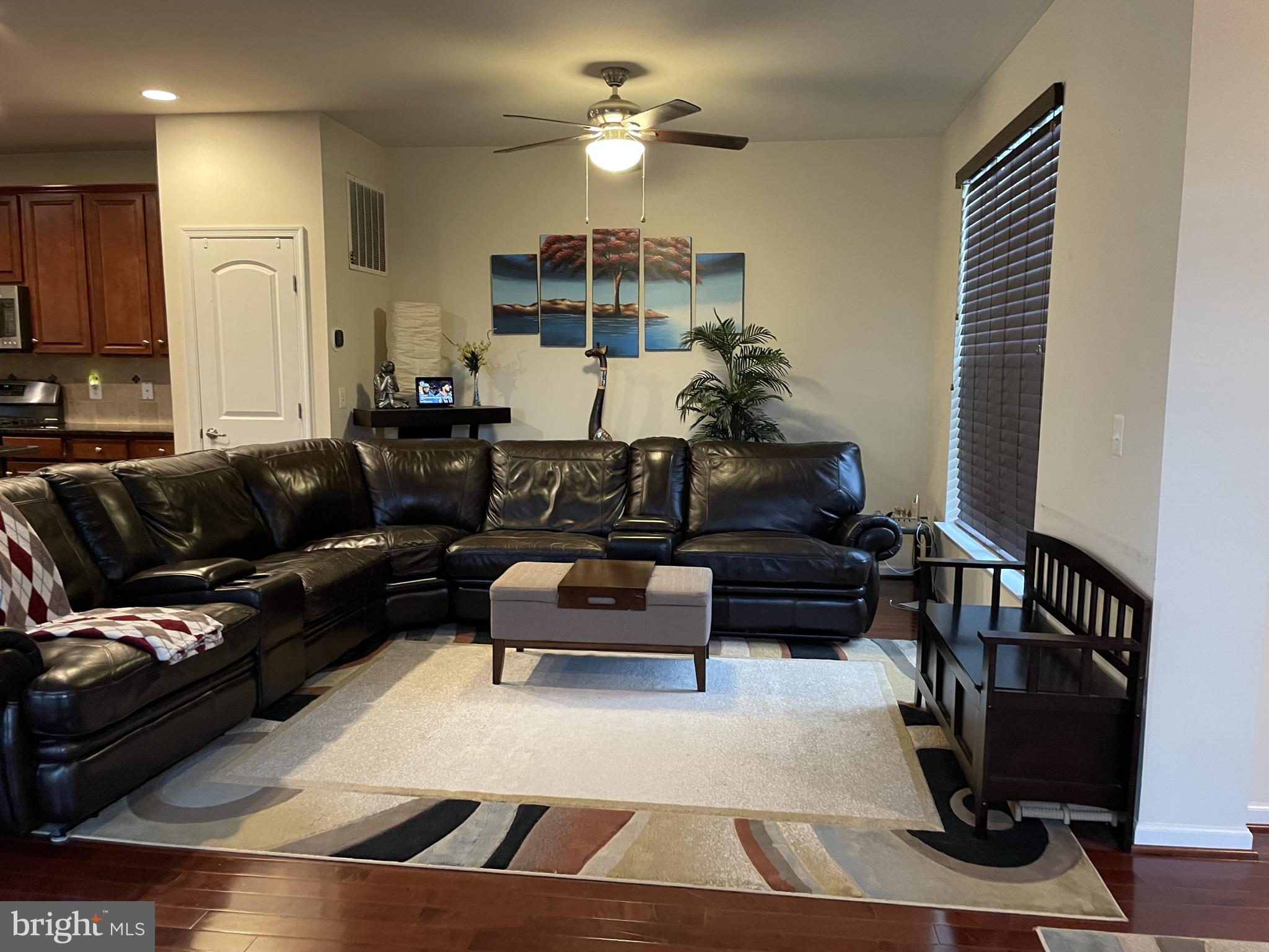 25271 Sackwheat Square Chantilly, VA 20152 - Photo 9 of 24 a living room with furniture and a chandelier