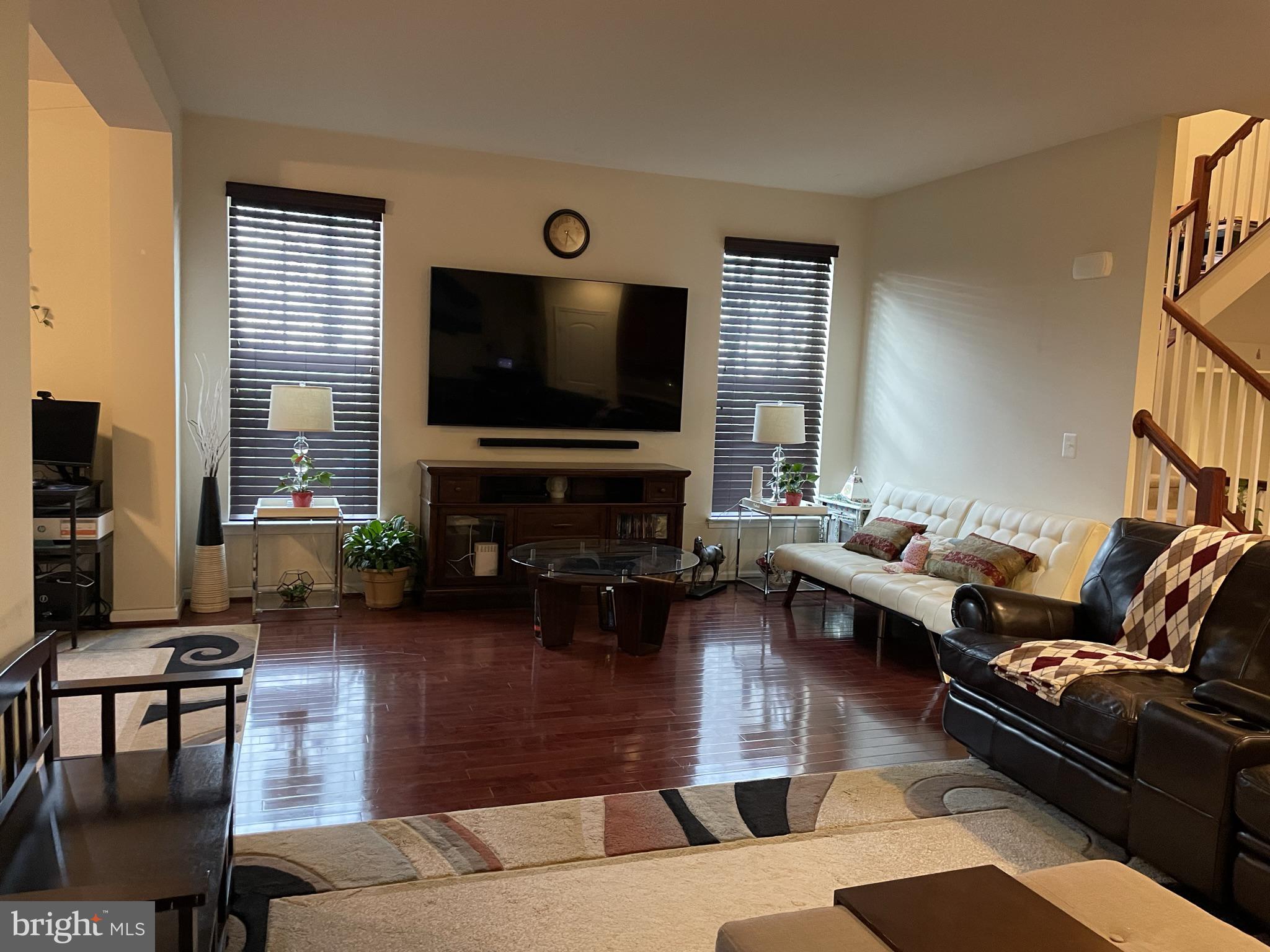 25271 Sackwheat Square Chantilly, VA 20152 - Photo 10 of 24 a living room with furniture and a flat screen tv