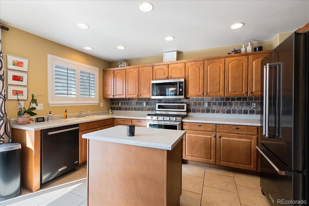 10318 South Rotherwood Circle Highlands Ranch, CO 80130 - Photo 8 of 29 Gallery Image 8