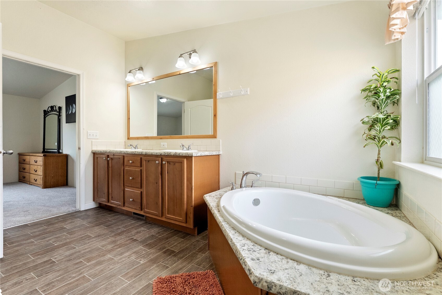 2431 Highway 153 Twisp, WA 98856 - Photo 19 of 40 a bathroom with a tub and sink