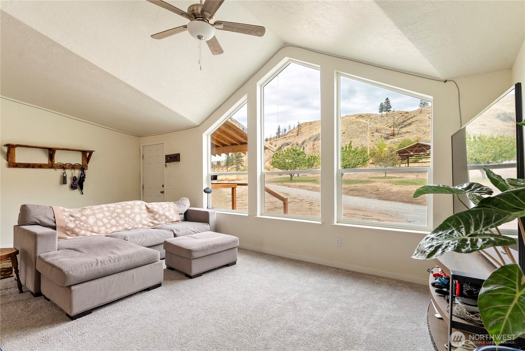 2431 Highway 153 Twisp, WA 98856 - Photo 7 of 40 a living room with furniture and a window