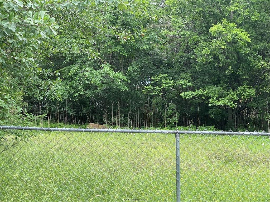 1403 Tisdale Street Bryan, TX 77808 - Photo 2 of 6 a view of a tennis court
