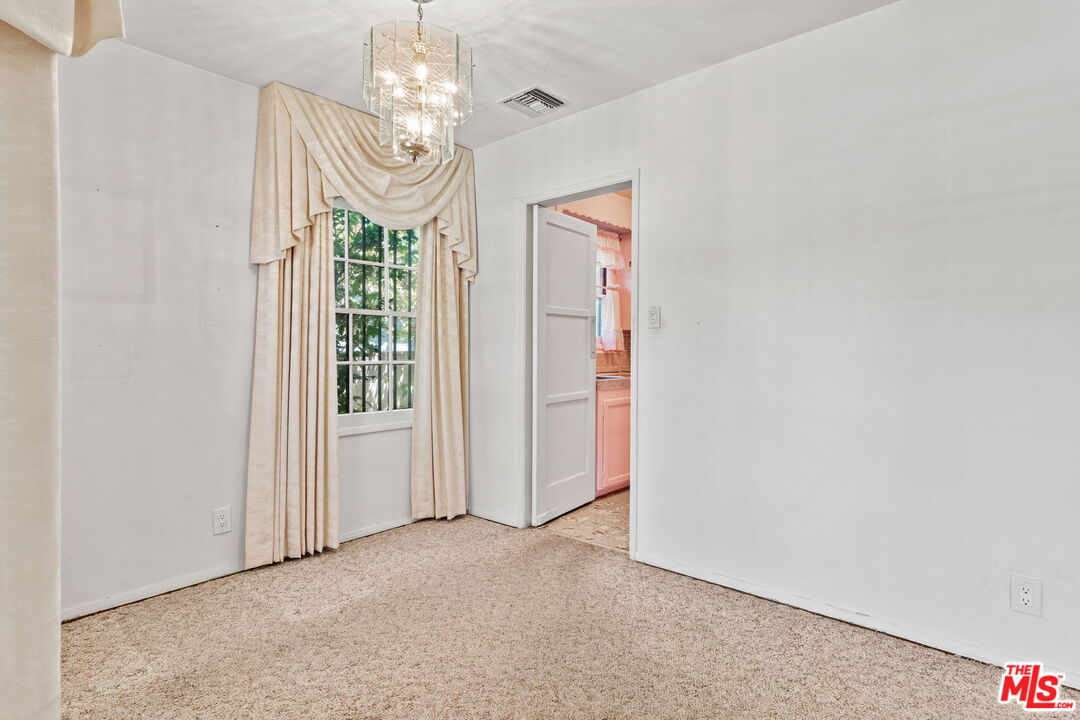 6900 Corbin Avenue Reseda, CA 91335 - Photo 11 of 35 a view of a chandelier in big room and chandelier