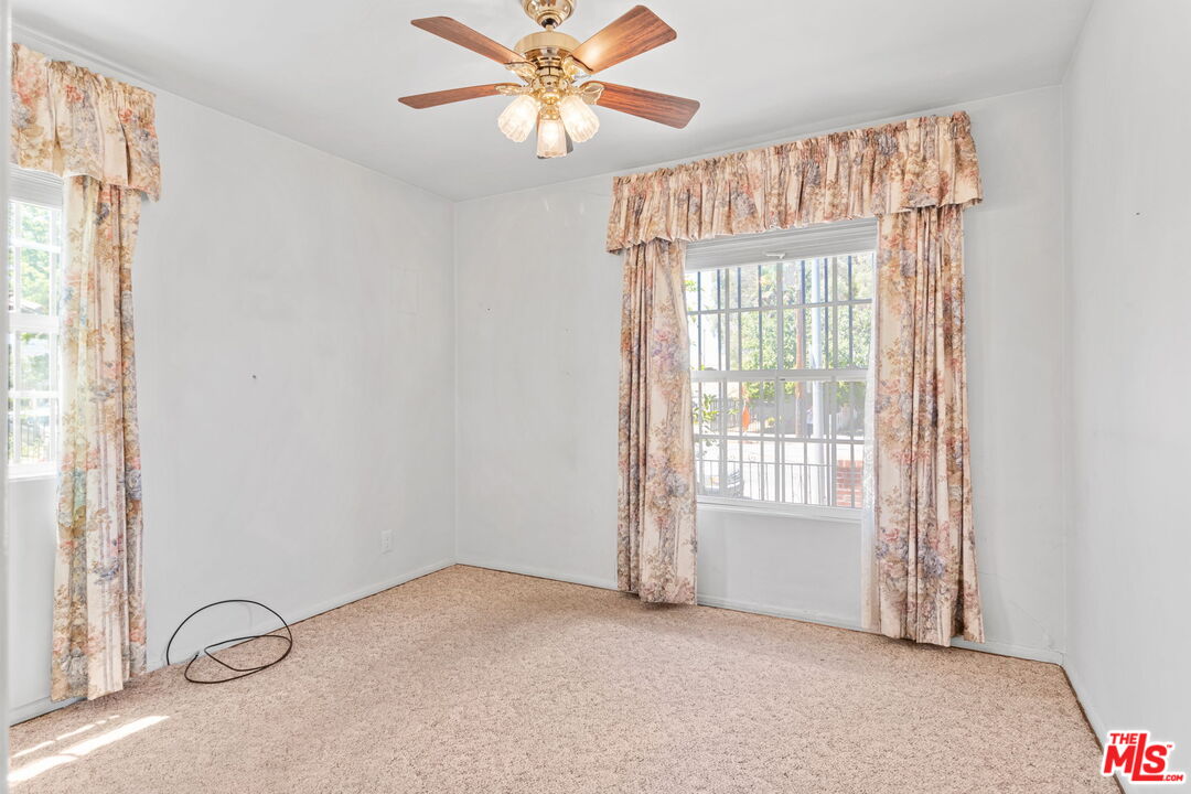 6900 Corbin Avenue Reseda, CA 91335 - Photo 20 of 35 a view of an empty room with a window
