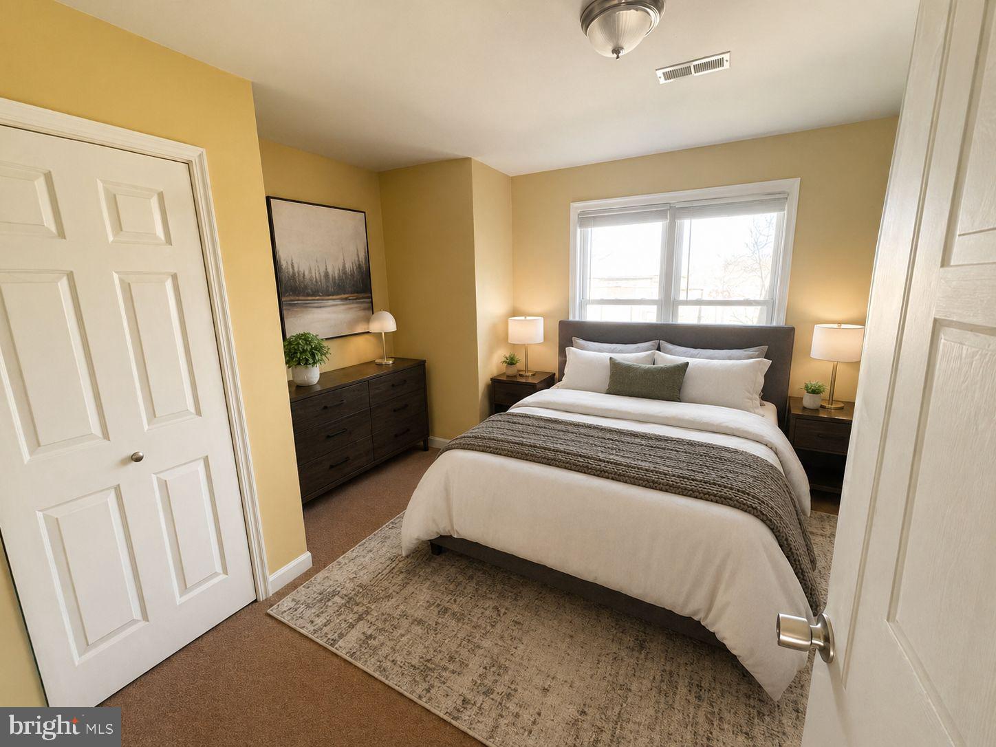 1618 Page Street, Unit A Philadelphia, PA 19121 - Photo 15 of 21 a bedroom with a bed and a window
