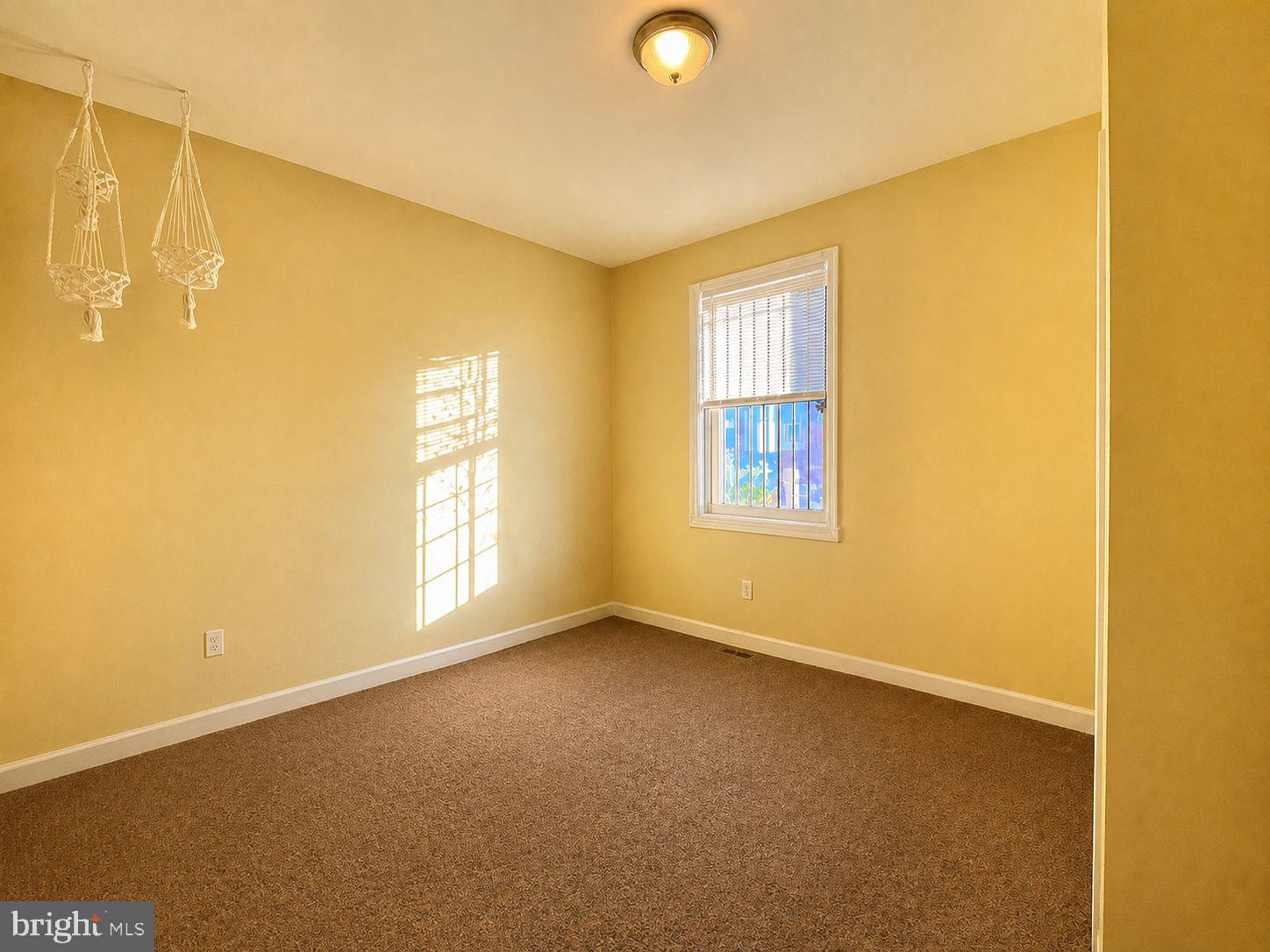 1618 Page Street, Unit A Philadelphia, PA 19121 - Photo 9 of 21 a view of empty room with windows