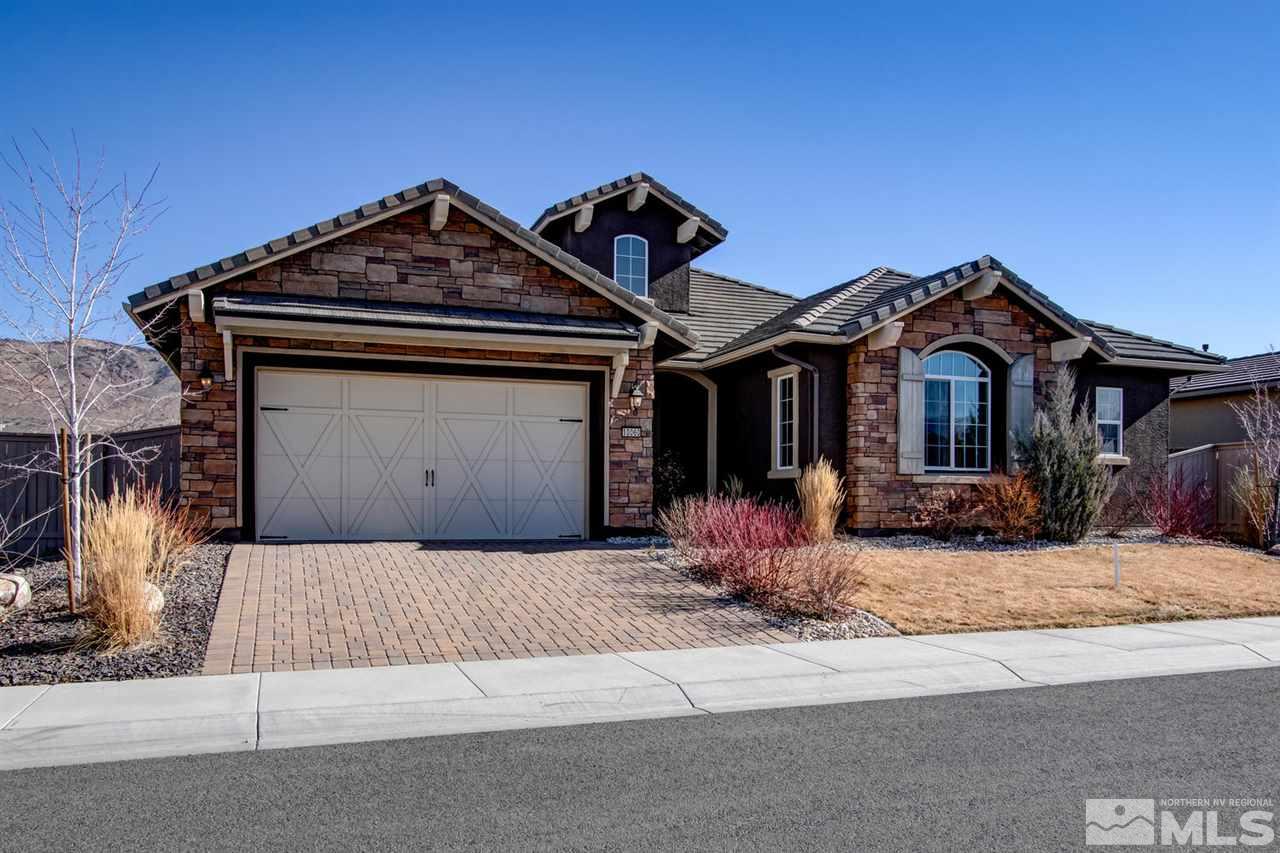 a front view of a house with yard