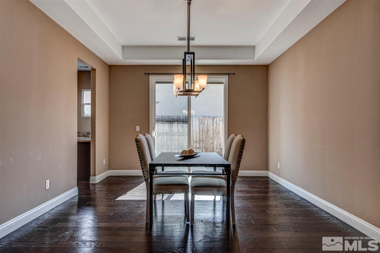10060 Gold Cup Lane Reno, NV 89521 - Photo 3 of 25 a dining room with furniture and window