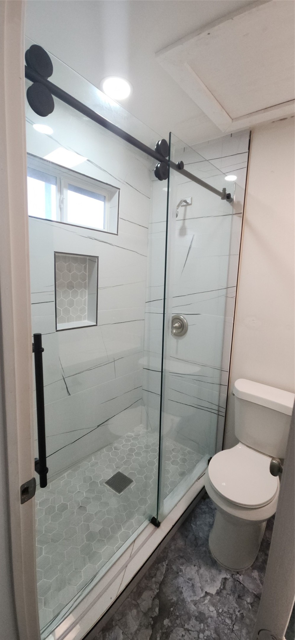 2304 Chapman Street, Unit 3 Houston, TX 77009 - Photo 15 of 17 a bathroom with a toilet and a shower