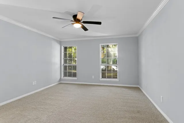 an empty room with windows