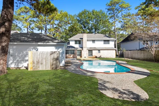 a view of a house with swimming pool