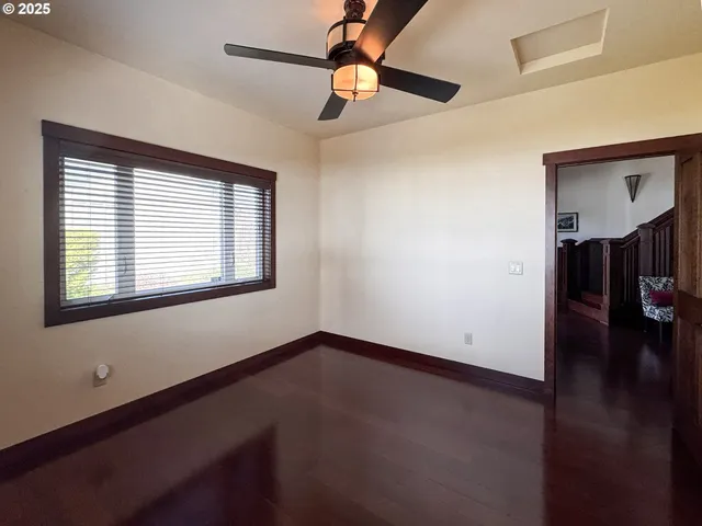 a bathroom with a toilet sink shower and mirror