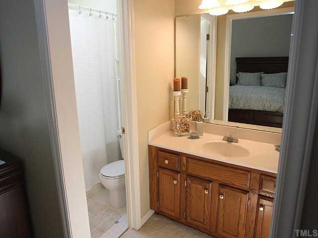 3505 Dechart Lane Raleigh, NC 27616 - Photo 8 of 12 The vanity has cultured marble top and updated lighting.