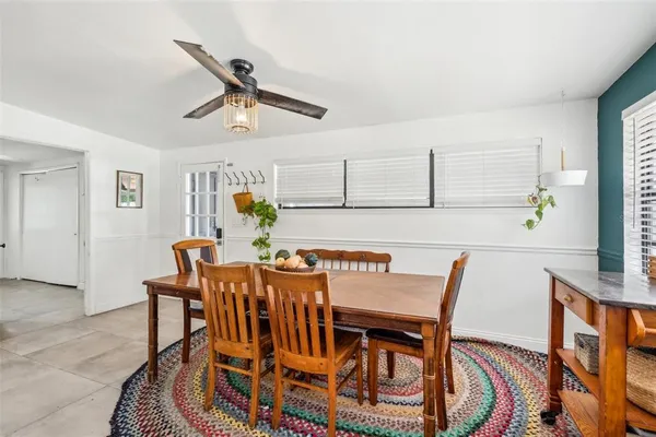 a view of a dining room with furniture