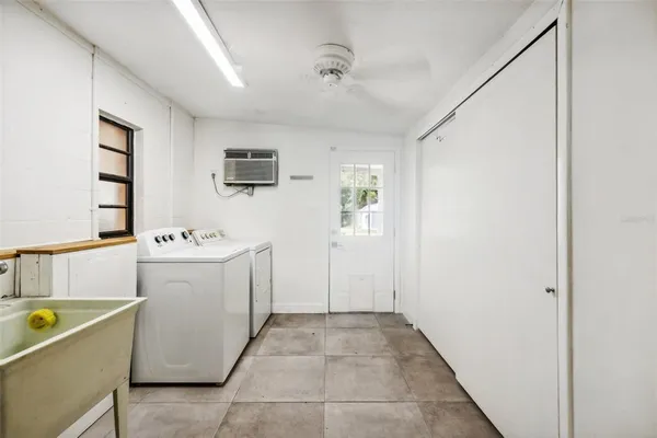 a utility room with dryer and washer