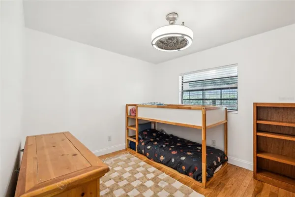 a bedroom with bunk bed