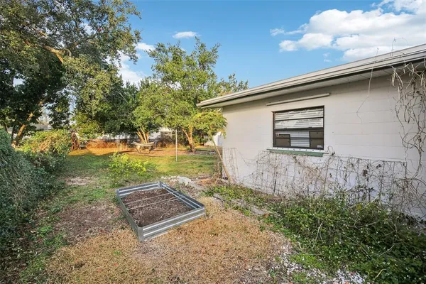 a backyard of a house with lots of green space