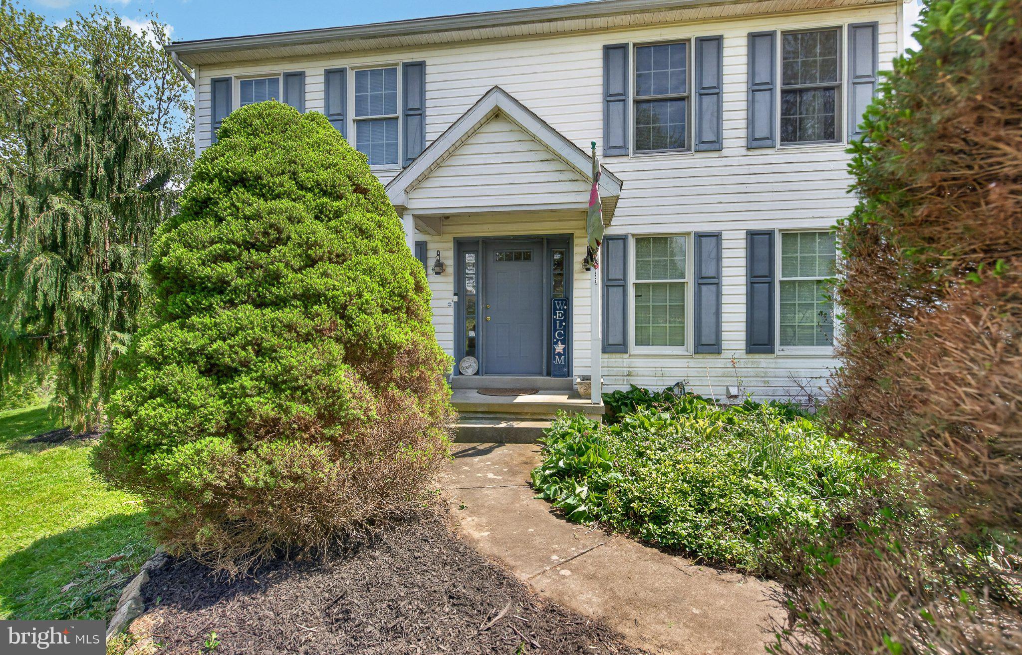 45 Latham Road Nottingham, PA 19362 - Photo 10 of 83 Charming home with lush greenery.