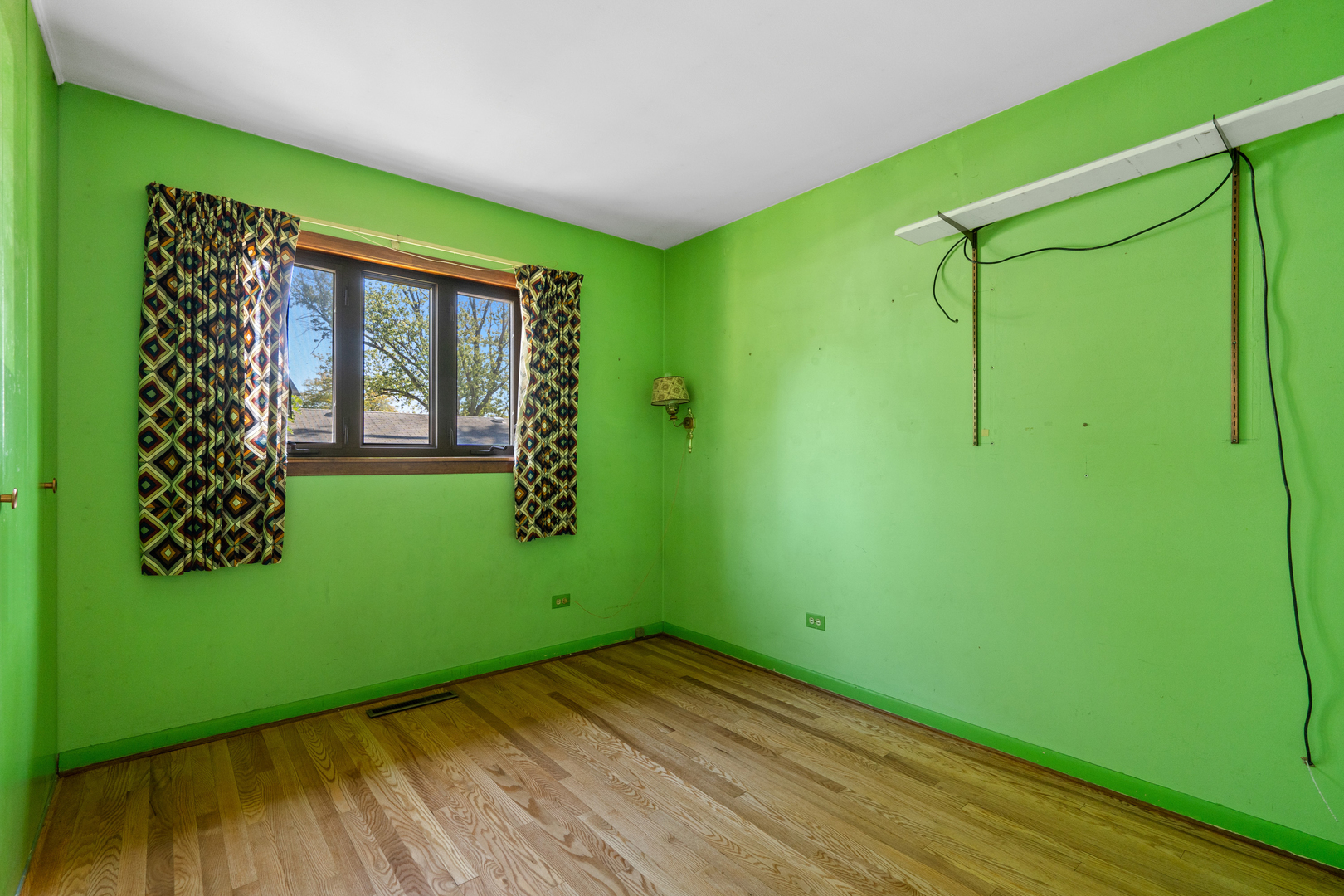 244 Thomas Street Park Forest, IL 60466 - Photo 13 of 30 a view of a room with window wooden floor