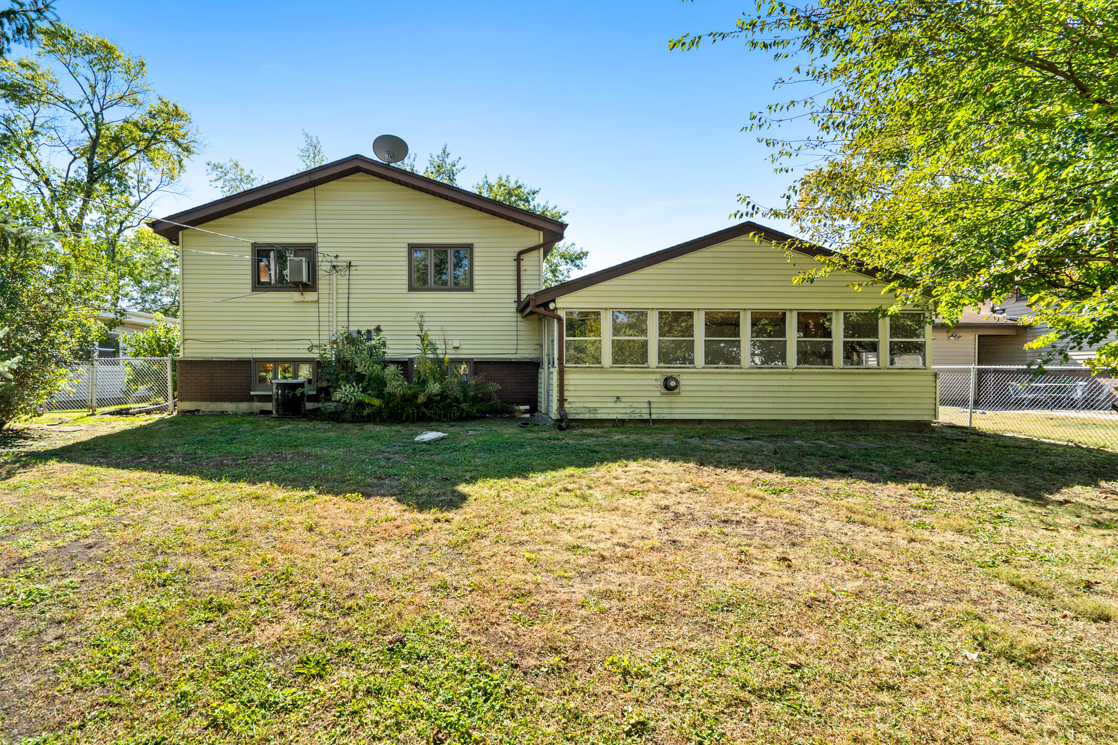 244 Thomas Street Park Forest, IL 60466 - Photo 22 of 30 a front view of a house with a yard