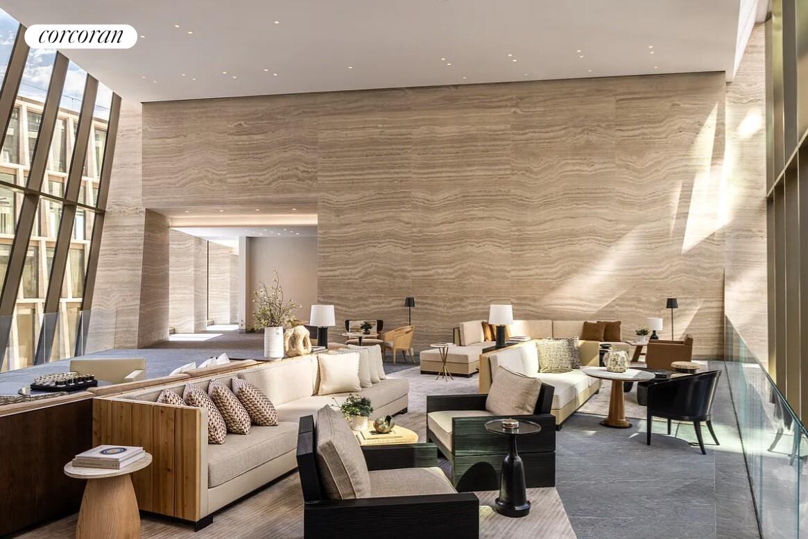 500 West 18th Street, Unit WEST5B Manhattan, NY 10011 - Photo 13 of 15 a living room with furniture and a large window