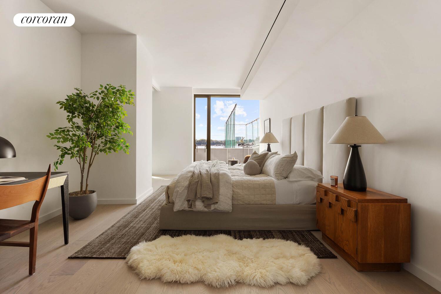 500 West 18th Street, Unit WEST5B Manhattan, NY 10011 - Photo 6 of 15 a bed room with a bed window and a table