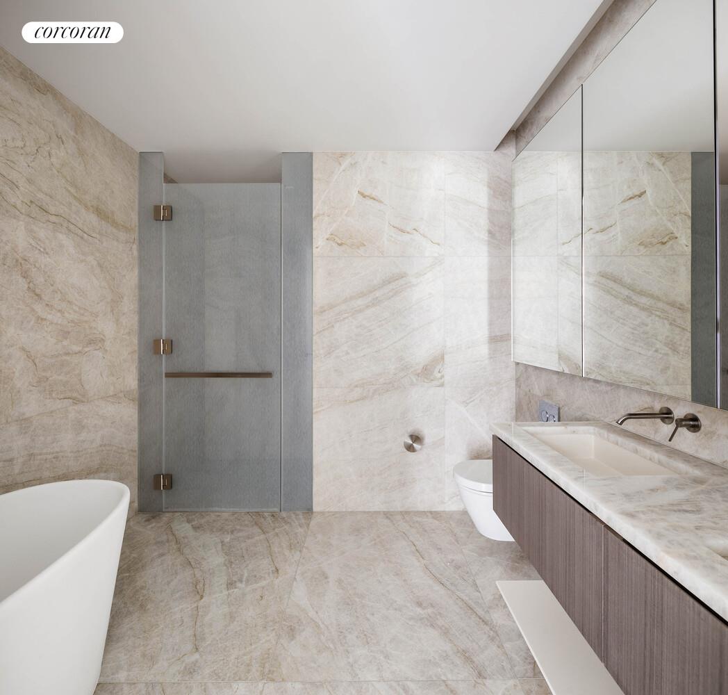 500 West 18th Street, Unit WEST5B Manhattan, NY 10011 - Photo 7 of 15 a bathroom with a granite countertop bathtub shower sink and mirror