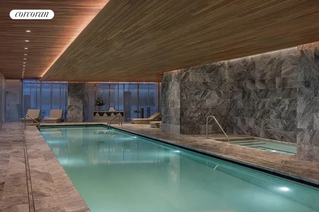 a view of floor to ceiling window and a wooden floor