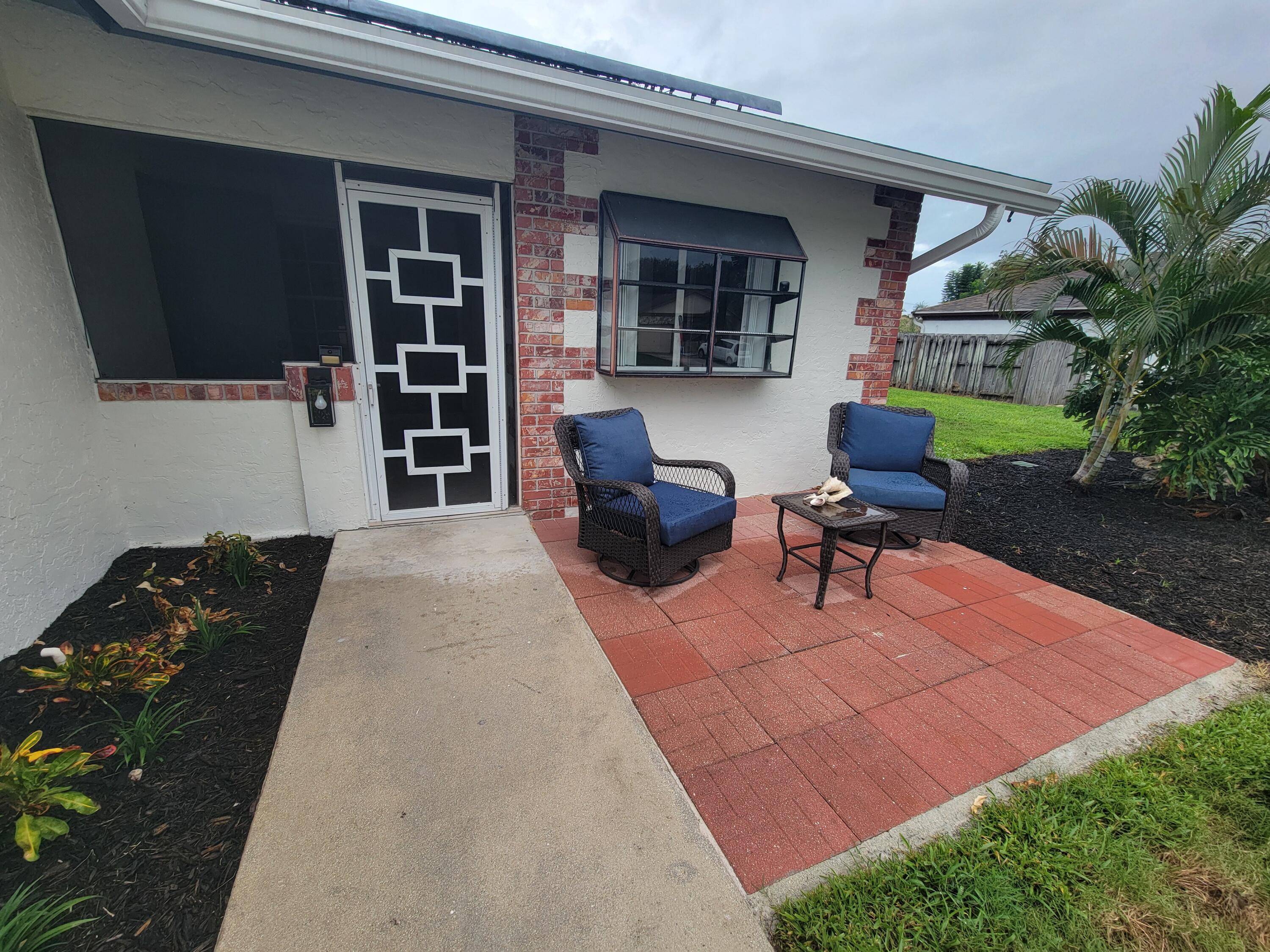 104 Arrowhead Circle Jupiter, FL 33458 - Photo 2 of 21 20251002_164301