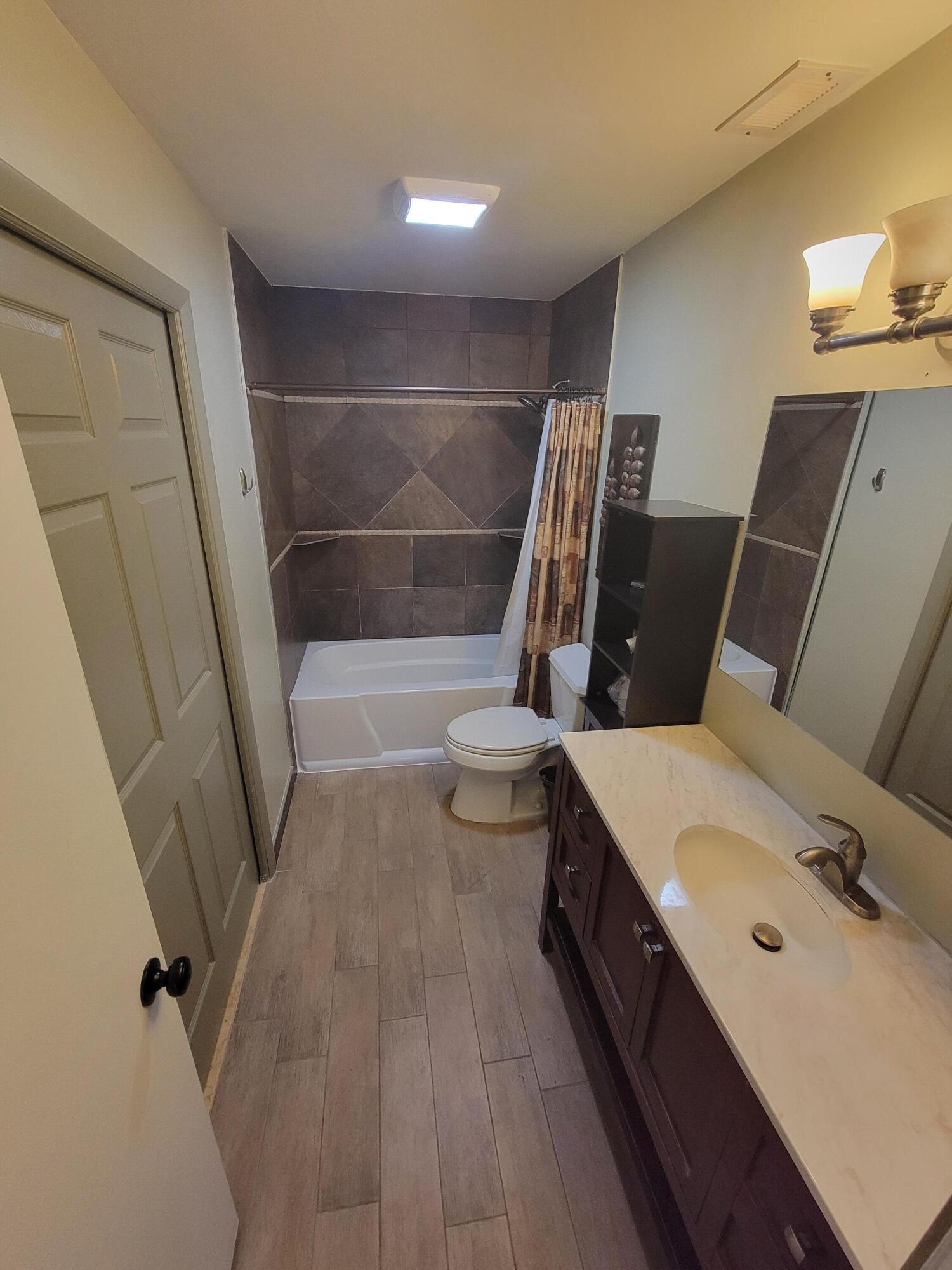 104 Arrowhead Circle Jupiter, FL 33458 - Photo 7 of 21 20251002_164613