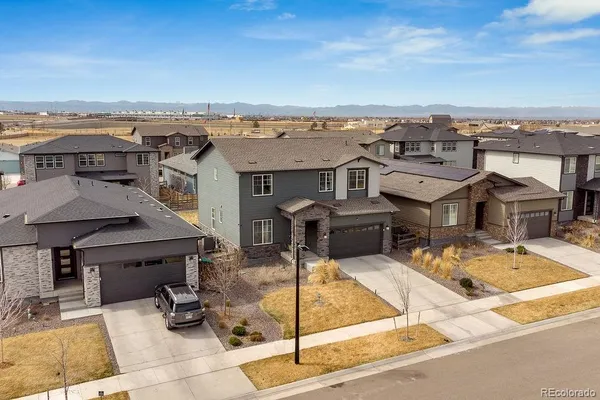 an aerial view of a house with swimming pool