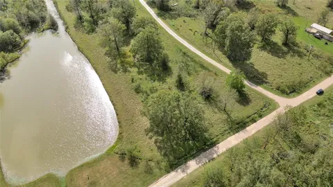 a view of swimming pool with a yard