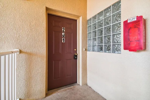 a view of a car parked in front of a house
